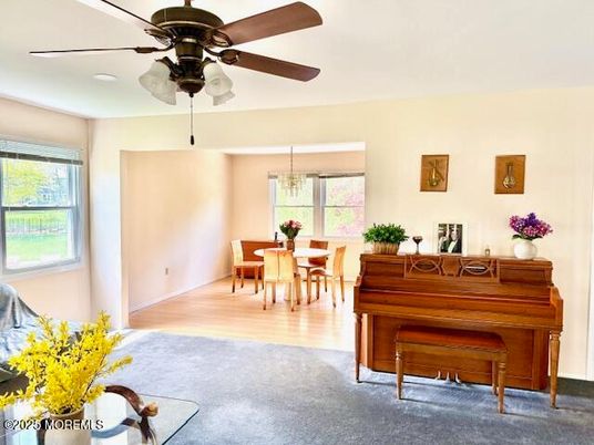 Dining room, Interior, Pendant Lights, Piano, Wood Texture Flooring