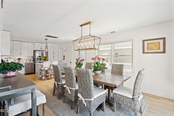 Dining room, Interior, Kitchen, Pendant Lights, Recessed Lighting, Stainless Steel Appliances, Wood Texture Flooring