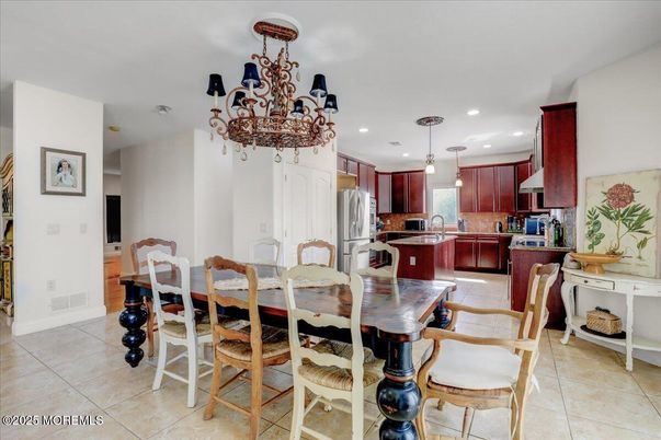 Chandelier, Dining room, Interior, Kitchen, Pendant Lights, Recessed Lighting, Stainless Steel Appliances