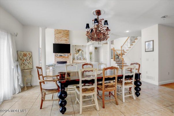 Chandelier, Dining room, Fireplace, Interior, Recessed Lighting
