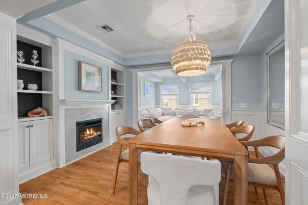 Dining room, Fireplace, Interior, Pendant Lights, Wood Texture Flooring