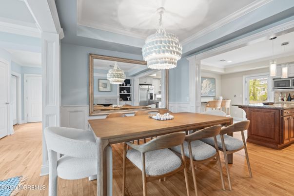 Chandelier, Dining room, Interior, Kitchen, Pendant Lights, Recessed Lighting, Stainless Steel Appliances, Wood Texture Flooring