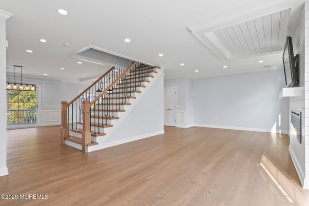 Empty room, Fireplace, Interior, Pendant Lights, Recessed Lighting, Wood Texture Flooring