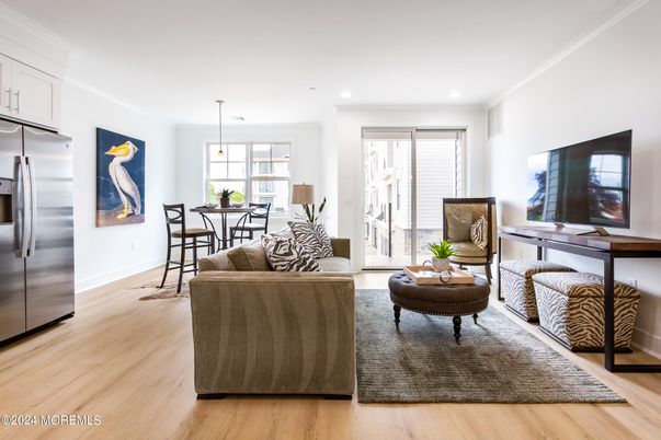 Dining room, Interior, Kitchen, Living room, Pendant Lights, Recessed Lighting, Stainless Steel Appliances, Wood Texture Flooring