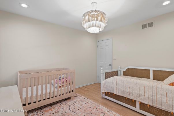 Bedroom, Chandelier, Interior, Recessed Lighting, Wood Texture Flooring