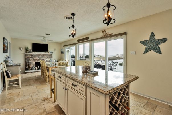 Chandelier, Dining room, Fireplace, Interior, Pendant Lights