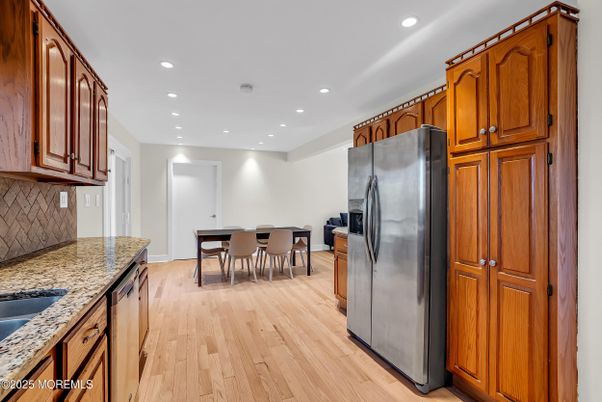 Dining room, Interior, Kitchen, Recessed Lighting, Stainless Steel Appliances, Wood Texture Flooring