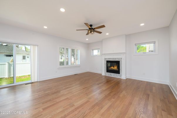 Empty room, Fireplace, Interior, Recessed Lighting, Wood Texture Flooring