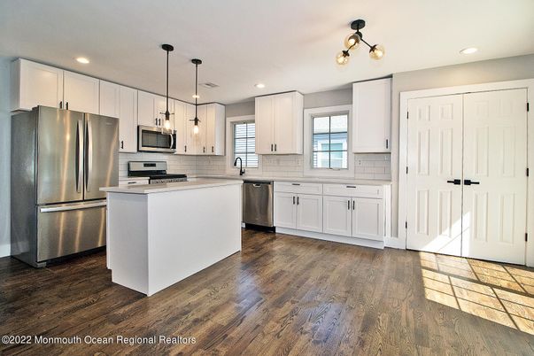 Interior, Kitchen, Pendant Lights, Recessed Lighting, Stainless Steel Appliances, Wood Texture Flooring