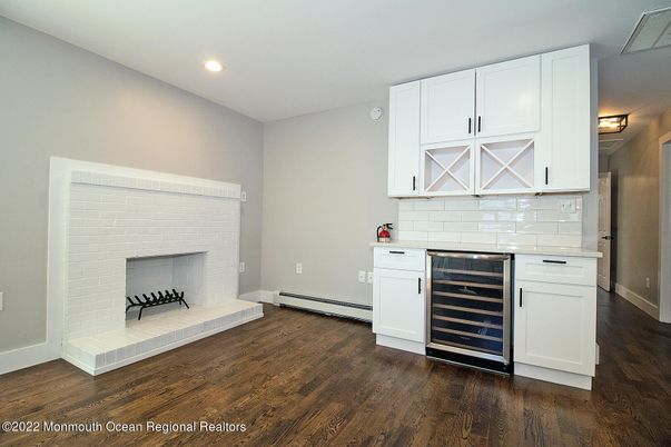 Fireplace, Interior, Kitchen, Recessed Lighting, Wood Texture Flooring