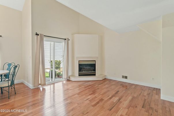 Dining room, Empty room, Fireplace, Interior, Wood Texture Flooring