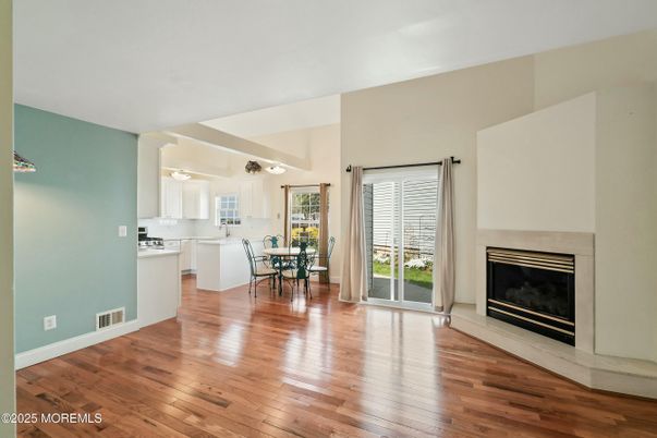 Dining room, Fireplace, Interior, Kitchen, Pendant Lights, Wood Texture Flooring
