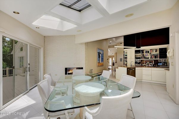 Dining room, Fireplace, Interior, Living room, Recessed Lighting, Stone Walls