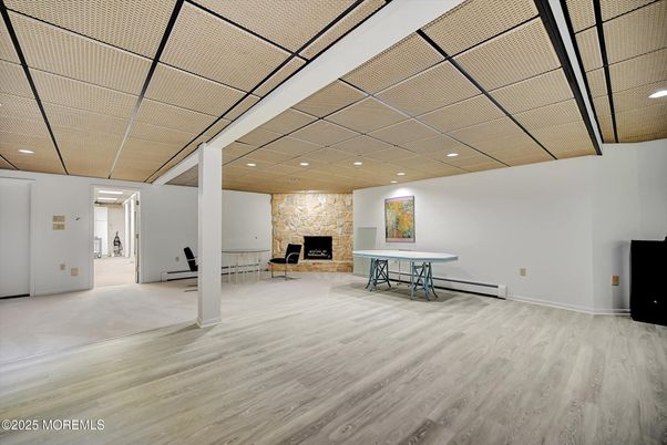 Fireplace, Interior, Recessed Lighting, Stone Walls, Wood Texture Flooring