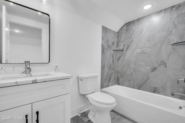 Bathroom, Dual Sink Vanities, Interior, Marble, Marble Walls, Recessed Lighting
