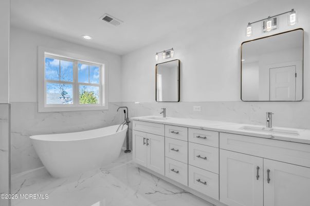 Bathroom, Dual Sink Vanities, Free Standing Baths, Interior, Marble, Marble Walls, Recessed Lighting