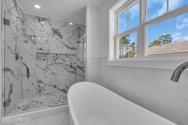 Bathroom, Free Standing Baths, Glass Shower, Interior, Marble Walls, Recessed Lighting