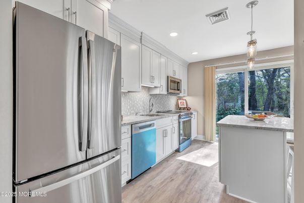 Interior, Kitchen, Pendant Lights, Recessed Lighting, Stainless Steel Appliances, Wood Texture Flooring