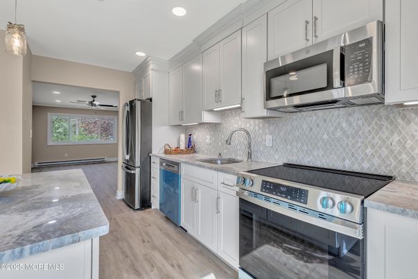 Interior, Kitchen, Pendant Lights, Recessed Lighting, Stainless Steel Appliances, Wood Texture Flooring