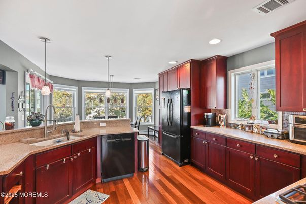 Interior, Kitchen, Pendant Lights, Recessed Lighting, Stainless Steel Appliances, Wood Texture Flooring