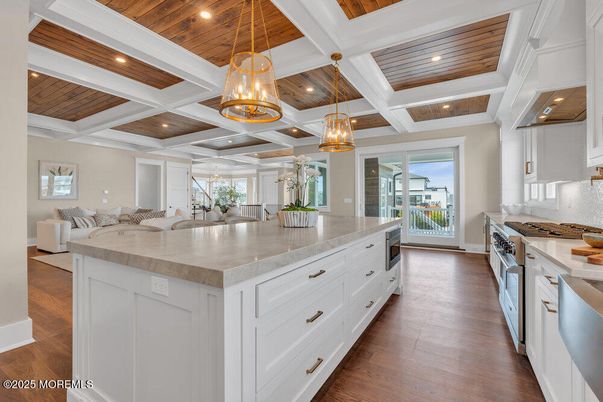 Chandelier, Interior, Kitchen, Living room, Pendant Lights, Recessed Lighting, Stainless Steel Appliances, Wooden Ceilings, Wood Texture Flooring