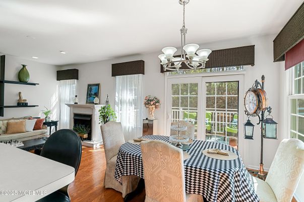 Chandelier, Dining room, Fireplace, Interior, Living room, Recessed Lighting, Wood Texture Flooring