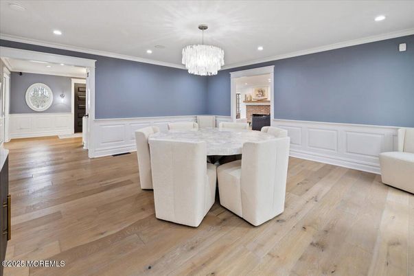 Chandelier, Dining room, Fireplace, Interior, Recessed Lighting, Wood Texture Flooring