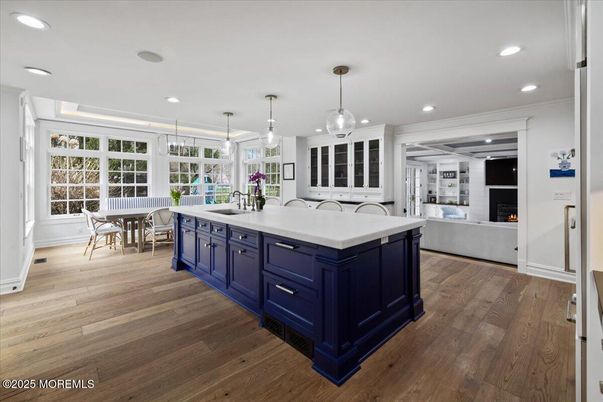 Dining room, Fireplace, Interior, Kitchen, Pendant Lights, Recessed Lighting, Wood Texture Flooring