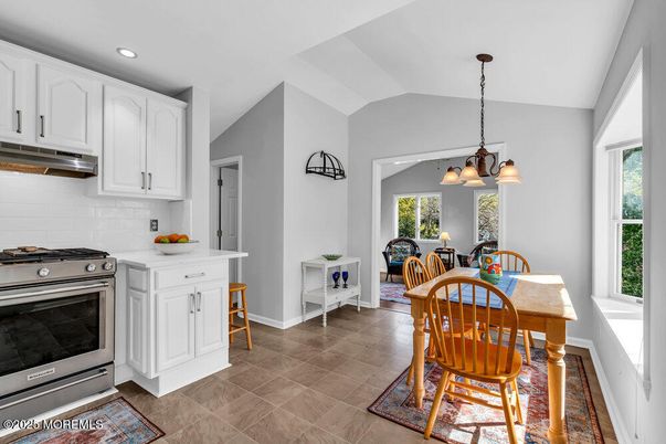 Chandelier, Dining room, Interior, Kitchen, Pendant Lights, Recessed Lighting, Stainless Steel Appliances