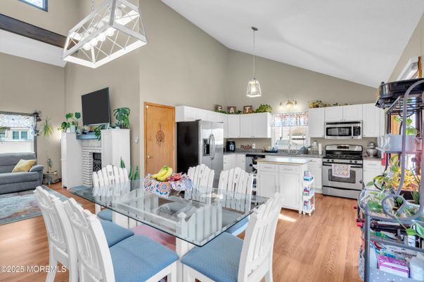 Dining room, Interior, Kitchen, Pendant Lights, Stainless Steel Appliances, Wood Texture Flooring