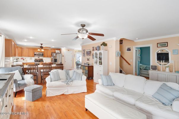 Dining room, Interior, Kitchen, Living room, Recessed Lighting, Stainless Steel Appliances, Wood Texture Flooring