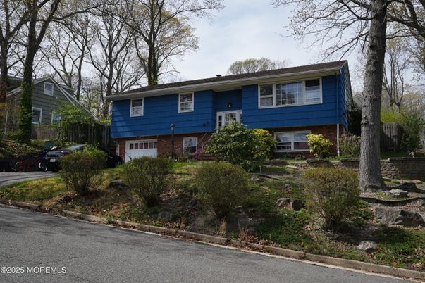 Attached, Exterior, Facade, Brick Facade, Raised Ranch