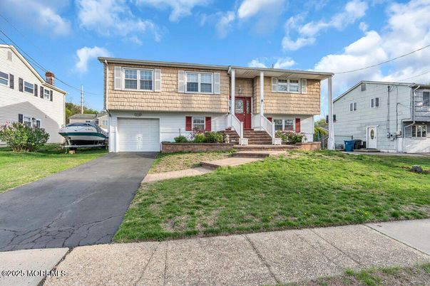 Attached, Exterior, Facade, Raised Ranch