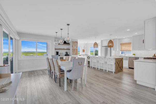 Dining room, Interior, Kitchen, Pendant Lights, Recessed Lighting, Stainless Steel Appliances, Wood Texture Flooring