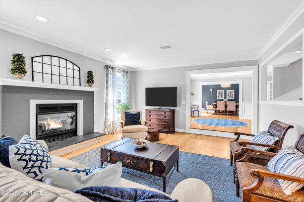 Dining room, Fireplace, Interior, Living room, Recessed Lighting, Wood Texture Flooring