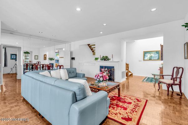 Dining room, Fireplace, Interior, Living room, Pendant Lights, Recessed Lighting, Wood Texture Flooring