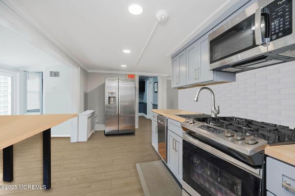 Interior, Kitchen, Recessed Lighting, Stainless Steel Appliances, Wood Texture Flooring