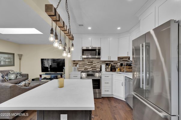 Interior, Kitchen, Pendant Lights, Recessed Lighting, Stainless Steel Appliances, Wood Texture Flooring