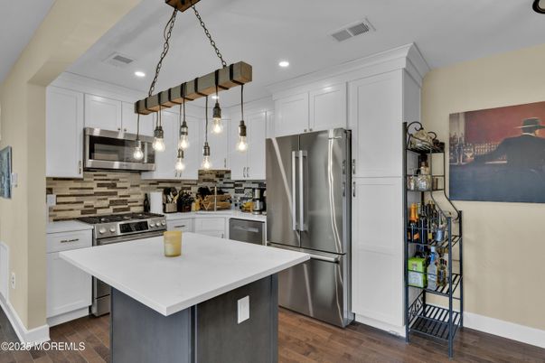Interior, Kitchen, Pendant Lights, Recessed Lighting, Stainless Steel Appliances, Wood Texture Flooring