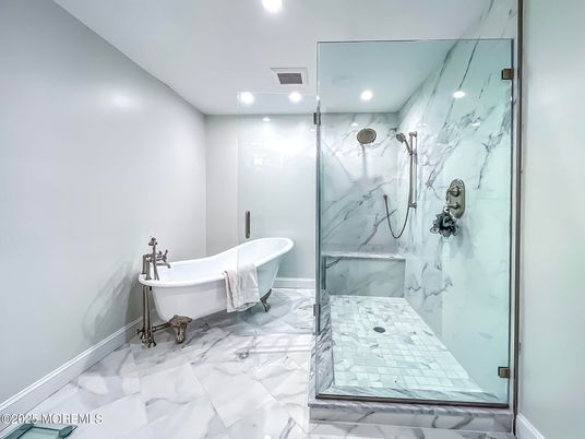 Bathroom, Free Standing Baths, Glass Shower, Interior, Marble, Marble Walls, Recessed Lighting