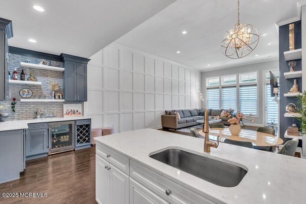 Chandelier, Dining room, Interior, Kitchen, Living room, Pendant Lights, Recessed Lighting, Wood Texture Flooring