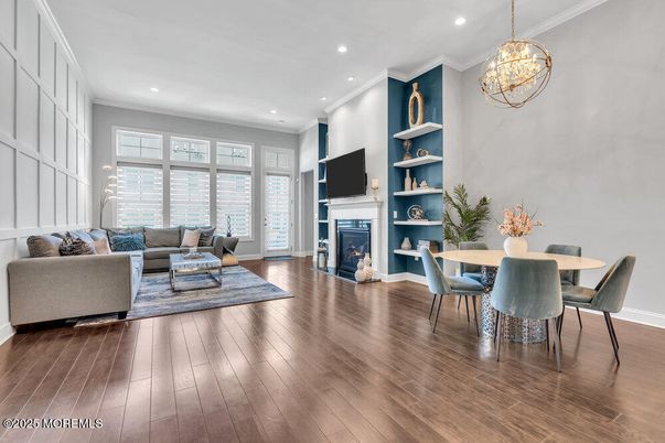 Dining room, Fireplace, Interior, Living room, Pendant Lights, Recessed Lighting, Wood Texture Flooring