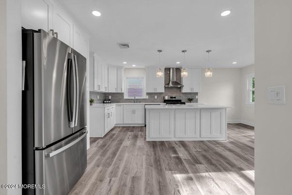 Interior, Kitchen, Pendant Lights, Recessed Lighting, Stainless Steel Appliances, Wood Texture Flooring