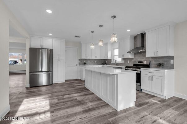 Interior, Kitchen, Pendant Lights, Recessed Lighting, Stainless Steel Appliances, Wood Texture Flooring