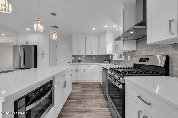Interior, Kitchen, Pendant Lights, Recessed Lighting, Stainless Steel Appliances, Wood Texture Flooring