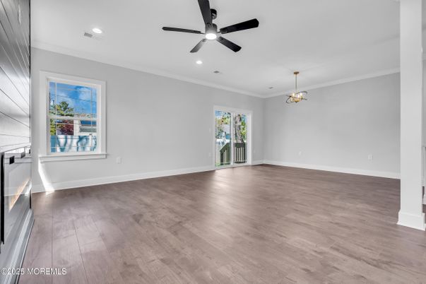 Empty room, Fireplace, Interior, Pendant Lights, Recessed Lighting, Wood Texture Flooring