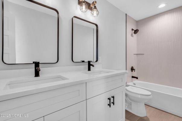 Bathroom, Dual Sink Vanities, Interior, Recessed Lighting, Wood Texture Flooring
