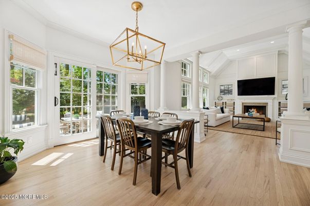 Dining room, Fireplace, Interior, Living room, Pendant Lights, Recessed Lighting, Wood Texture Flooring