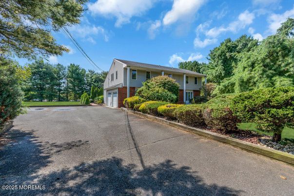 Attached, Exterior, Facade, Raised Ranch