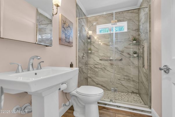 Bathroom, Glass Shower, Interior, Marble Walls, Wood Texture Flooring